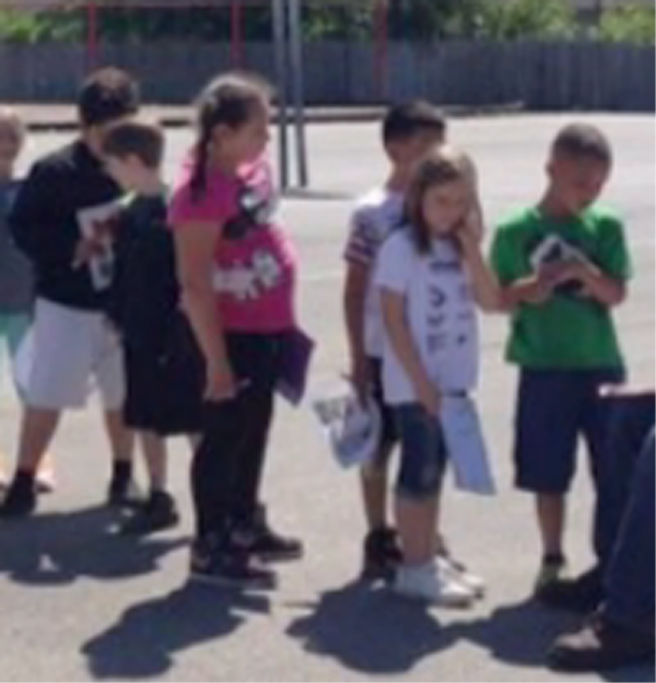 100 Students Line Up To Have Janitor Sign Their Yearbooks [Video]