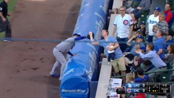 Catching a Fly Ball...WHILE FEEDING A BABY!