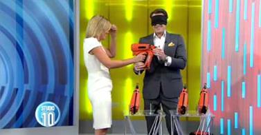 WATCH: Australian TV Host Almost Shot Herself In the Head With A Nail Gun